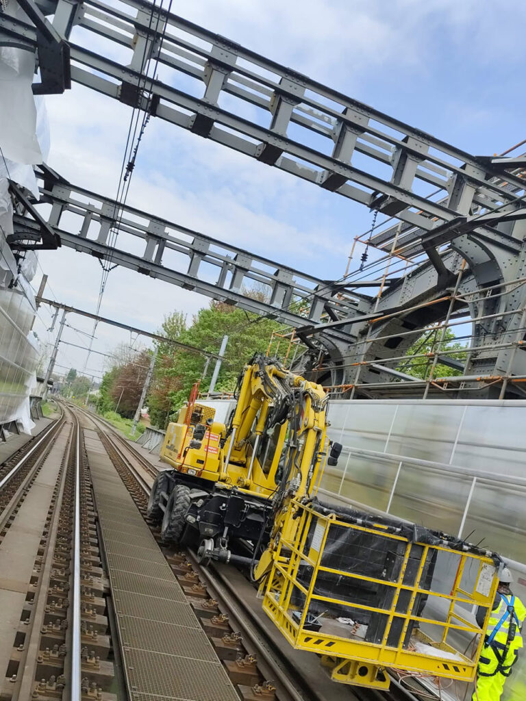 Sandblasting & Protective Painting of Railway Bridge Steel Structure